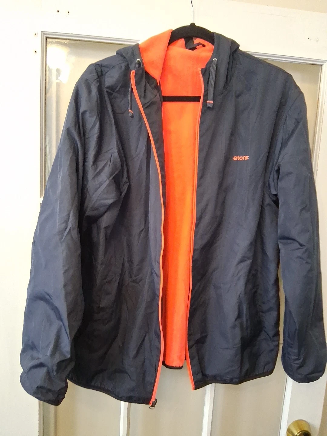 Etonic Lt Wt Windbreaker Hooded Jacket. Color Blue/Orange Medium K1