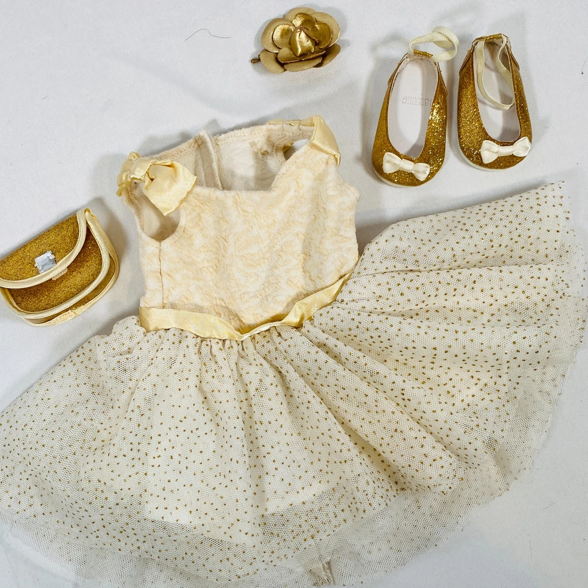 gold american girl doll dress She'll sparkle and shine right along with her Bitty Baby doll in matching  holiday dresses! This set features:Golden Twinkle Dress for Little Girls: A  pretty dress with layers of mesh with sparkly main image 1