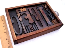 Antique/vintage letterpress in a stained box w/ square metal stand.