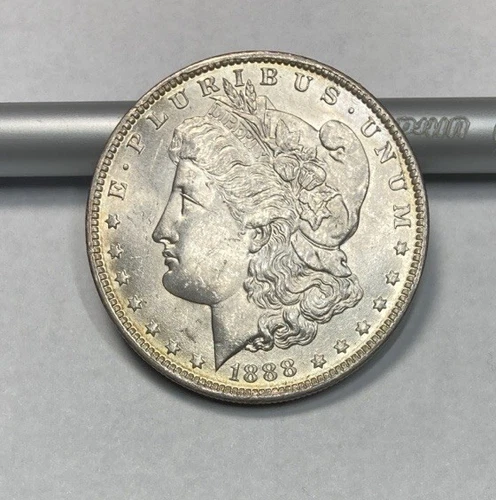 1888-O Morgan Silver Dollar Bright White with Hint of Golden Tone BU+