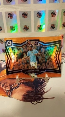 Jermeny Doku /75 orange Panini Select Prizm fieldlevel Manchester City Belgien - Bild 1 von 2