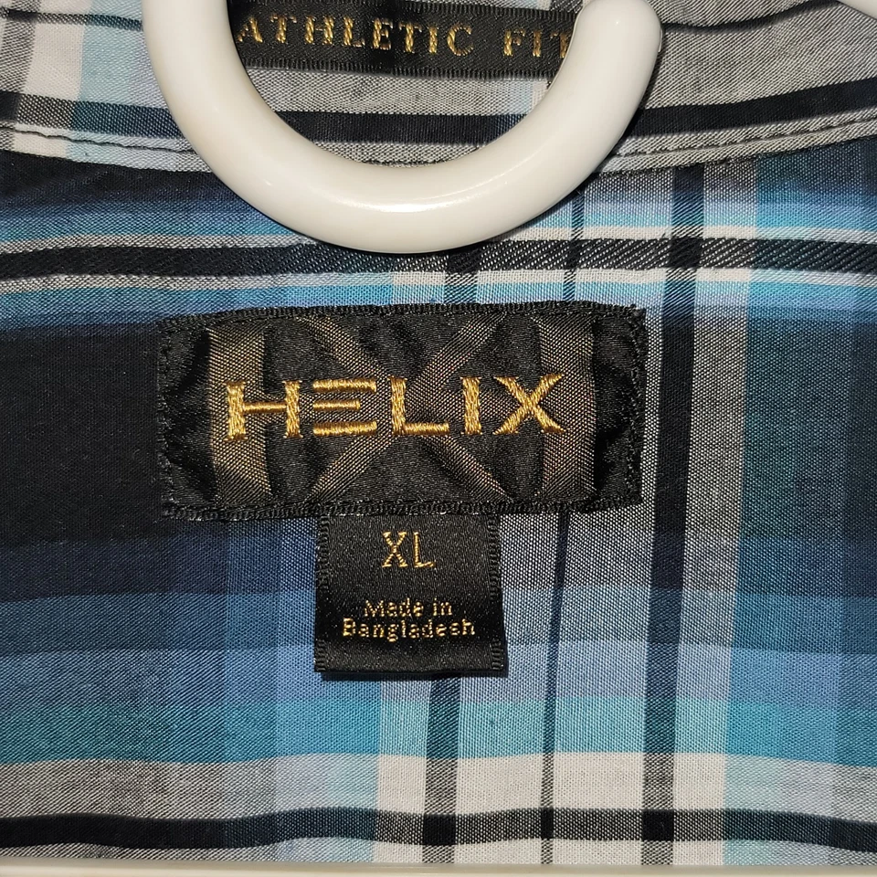 Polo HELIX con botones calce atlético a cuadros para hombre talla XL bolsillos delanteros Foto 2 de 4