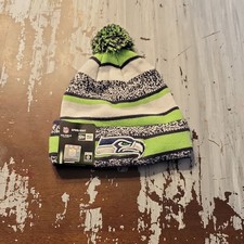 New Era NFL Seattle Seahawks On Field Sport Knit Cuffed Beanie with Pom