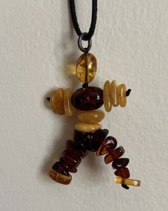 Vintage Egg Yolk and Cognac Baltic Amber Figurine Necklace 