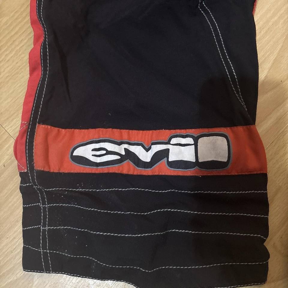 PANTALONES DE PAINTBALL EVIL NUEVOS CON ETIQUETAS XL ACOLCHADOS NEGROS ROJOS CARGO NYLON FORRADOS DE MALLA Foto 2 de 4