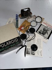 VINTAGE CAMERA ACCESSORIES LOT POLAROID AND LOTS OF MISC