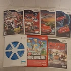 Nintendo Wii Game Lot: Super Smash Bros. Brawl, Cars Toon, Mario Bros, Alvin