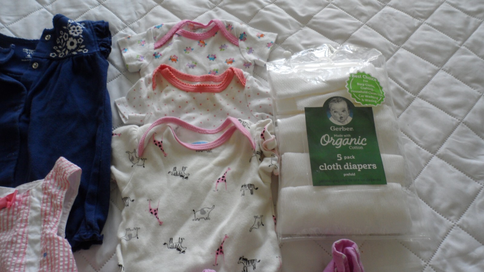 7 PIECE 06 MONTHS GIRLS BODYSUITS, CRAWLERS, ROMPERS AND CLOTH DIAPERS
