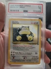 1999 POKEMON JUNGLE SNORLAX HOLO 11/64 PSA 7