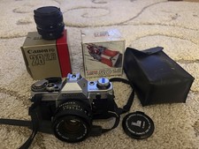 Canon AE-1 Program 35mm SLR Film Camera With Flash And Two Lenses