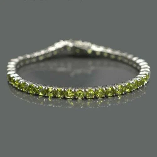 Brazalete Estate de 2,25 quilates de peridoto verde de corte redondo de oro blanco de 14 k sobre tenis Foto 3 de 3