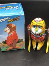 Vintage Wind Up Tin Toys Looping Monkey With Box