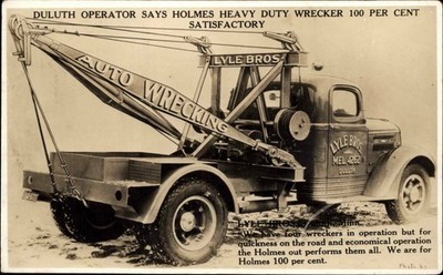 DULUTH MN Auto Wrecking TOW TRUCK LYLE BROS Vintage RPPC