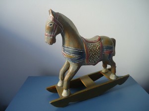 carved wooden rocking horse