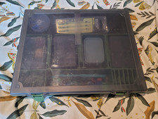 Large Carp fishing tackle box full of tackle and rig components.