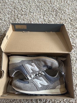 Used New Balance 574 Grey And White. Very Comfy And Cleaned.