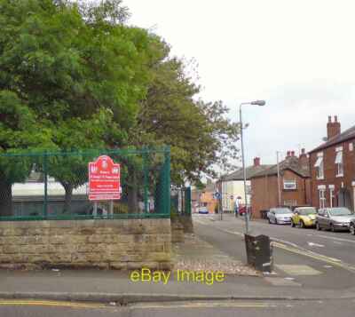 Photo 6x4 The corner of Tower Street and Henry Street Hyde Behind the wal c2016