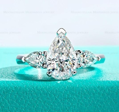 2.60 CTW Pear Cut Moissanite Three Stone Engagement Ring 14K White Gold Plated