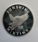 Sunshine Minting  silver round, contains 1 ounce  .999 fine silver