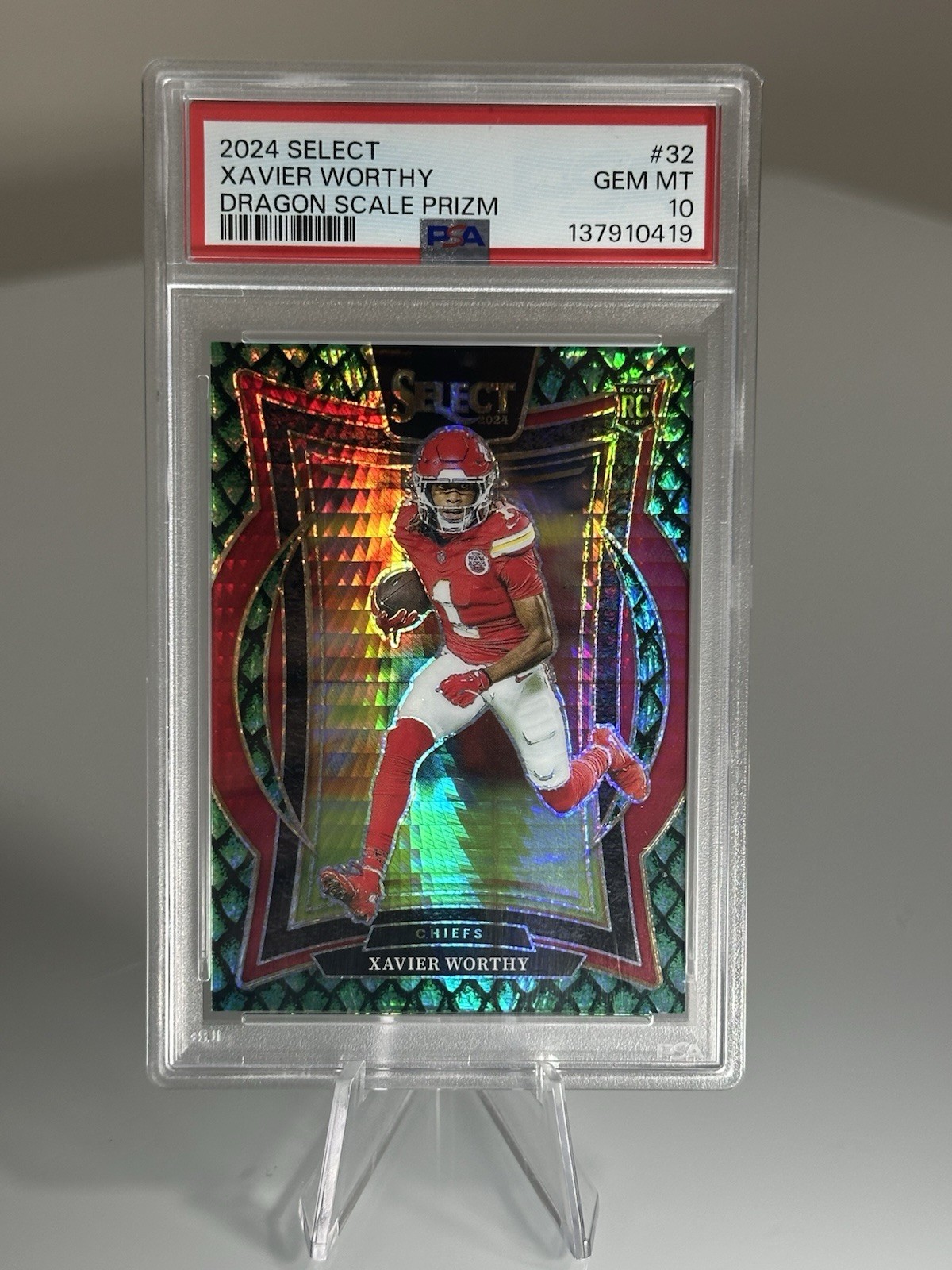 2024 Panini Select Concourse Xavier Worthy Dragon Scale Prizm /81 (RC) PSA 10