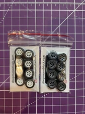 4 SETS, 16 WHEELS, 1:64 RUBBER 6 SPOKE WHITE AND GREY W/ AXLES MONOBLOCK