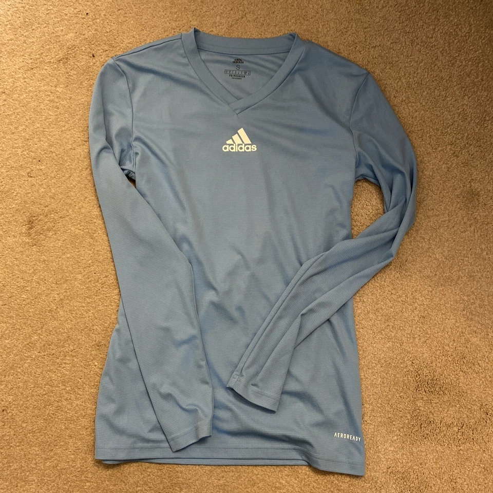 Adidas para hombre azul claro cuello en V capa base talla pequeña Foto 2 de 4