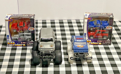 Lot 6 Monster Trucks Low Riders   2 Ford Bronco, 2 Chevy SS Concept, Hummer  New