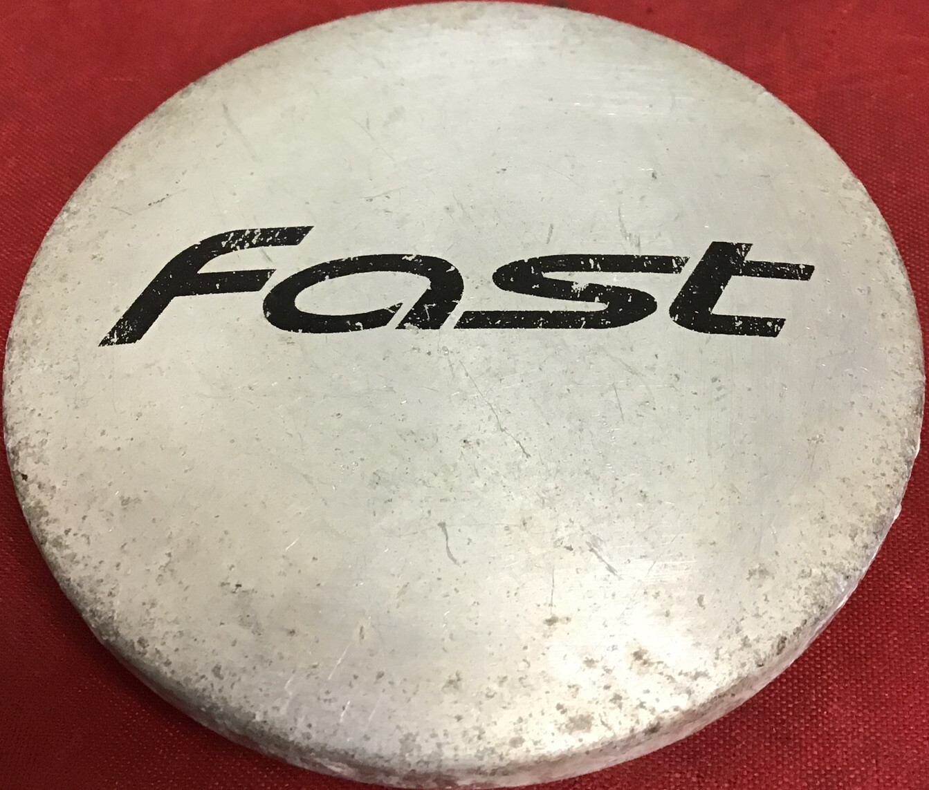 ONE USED FAST SILVER CENTERCAP C-V56-C 12644
