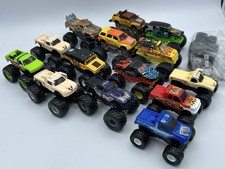 Lot Of 14 Monster Trucks Hot Wheels  Chrysler Die Cast  Plastic  Extra Wheels