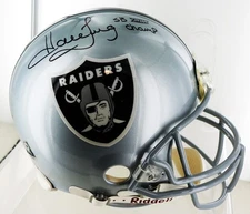 Raiders On Field Football Helmet by RiddelL. Autographed by Howie Long.