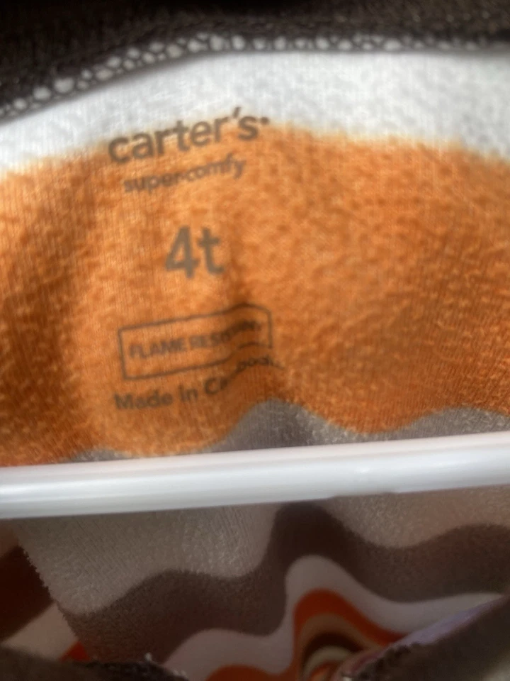 Pijama Carter’s Fleece Dinosaurio Stegosaurus Footie Naranja Marrón Crema Rayas 4 Foto 2 de 4