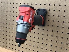 3D printed Milwaukee M12 10 degree Tool Holder for wall, pegboard, or Ryobi Link