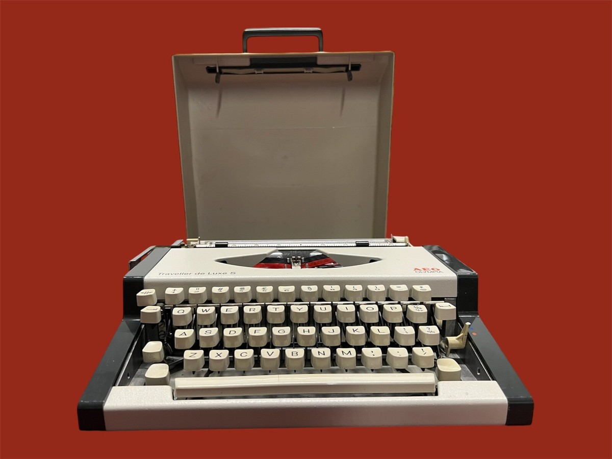 Vintage Olympia AEG Traveller De Luxe S Typewriter With Its