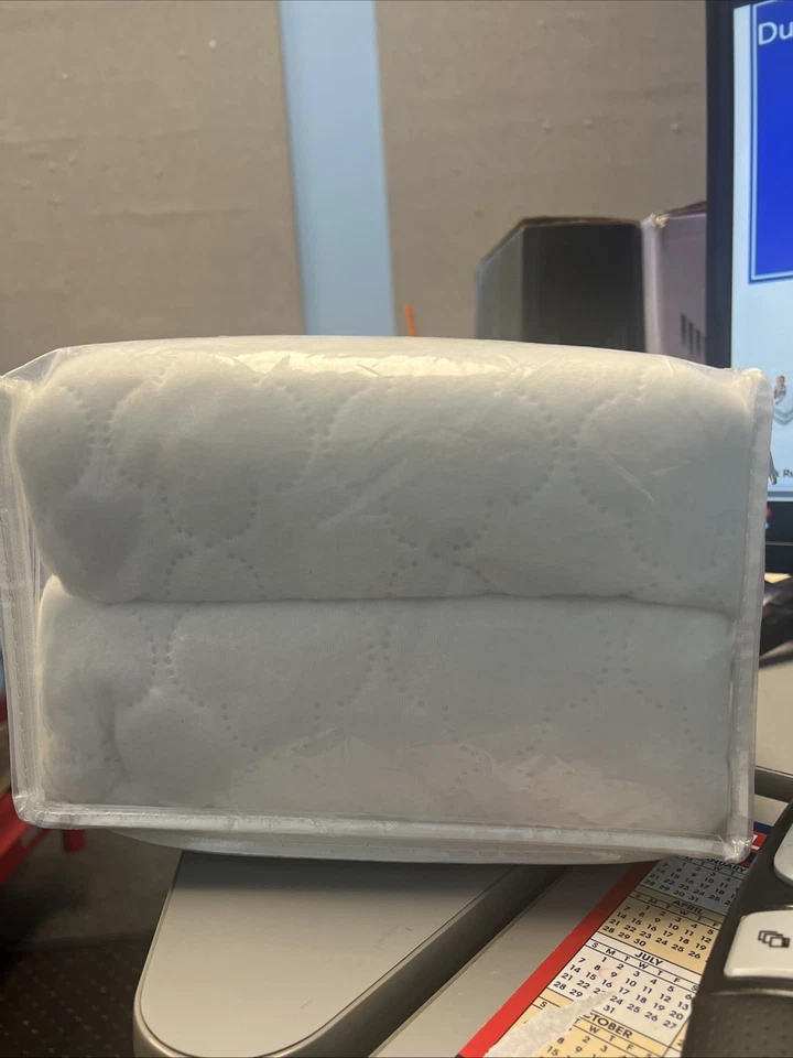 Paquete de 2 almohadillas impermeables para colchón para cuna Sealy ED008-QWX3 52x28 Foto 4 de 4