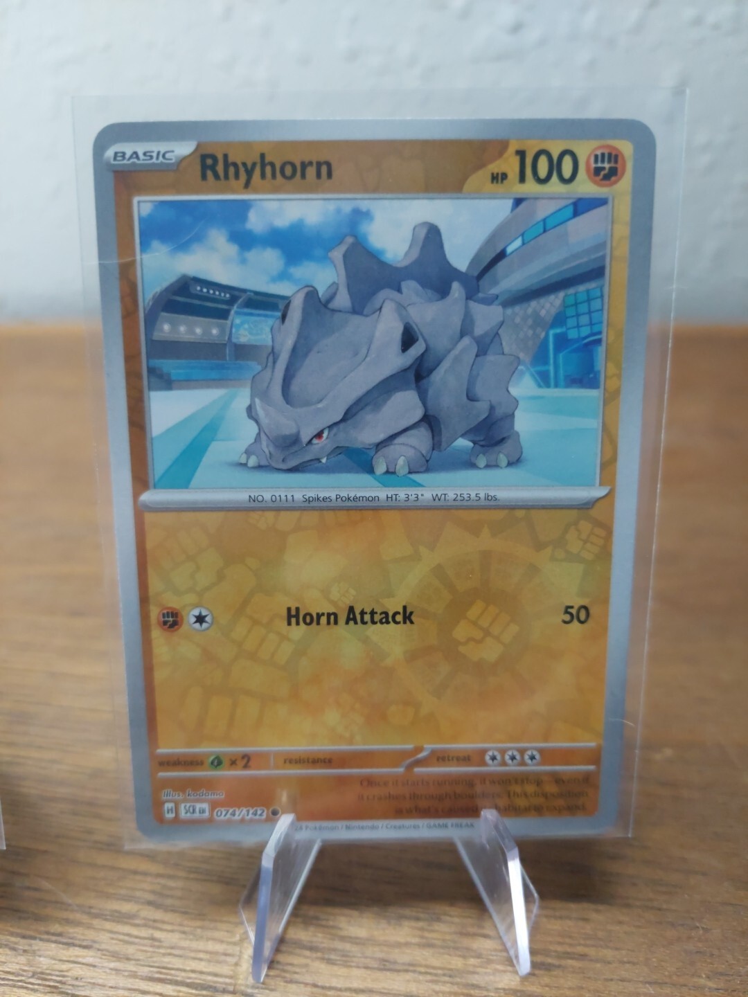 Rhyhorn - 074/142 Stellar Crown REVERSE Holo Pokemon - NM/MINT