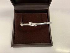 White Gold 9 ct Bangle with Five Diamonds.