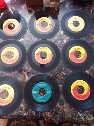 LOT OF 9 45 RPM RECORDS BY THE BEATLES