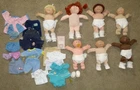 Lot of 7 Cabbage Patch Kids Dolls & Some Clothing