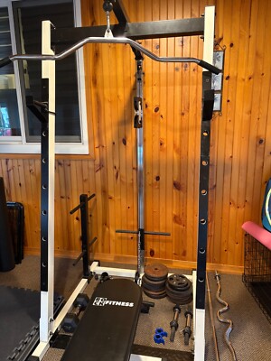 Gym power rack (Barbell + Curl Bar), Bench (Leg extension + Curls), Weights 