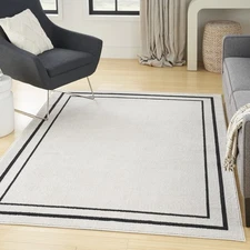 Home Essentials Indoor/Outdoor Ivory/Black 4' x 6' AreaRug, EasyCleaning, Non...
