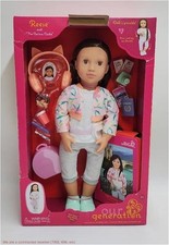 Muñeca de viaje posable y libro de cuentos Our Generation Reese 18" VER DETALLES
