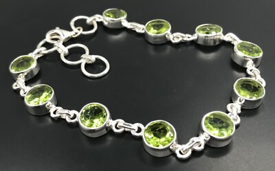 Peridot bracelet solid Sterling Silver round faceted natural stones. Hallmarked.
