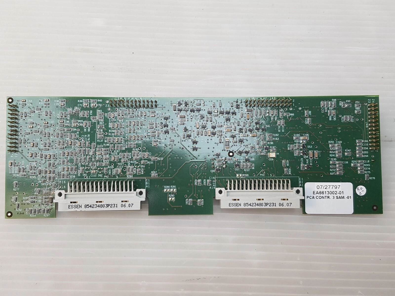 Solder side of the Lumenis EA6613002-01 with its two 3-row backplane connectors and label
