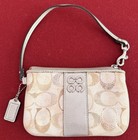 Pre-loved Coach Signature Small Sequin Wristlet — photo 1