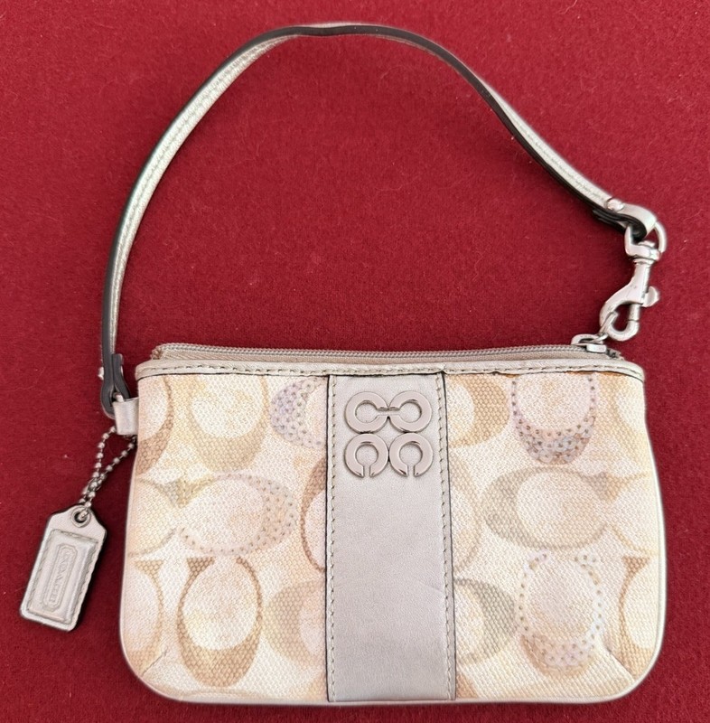 Pre-loved Coach Signature Small Sequin Wristlet