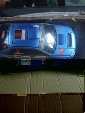 Tamiya Monte Carlo Subaru Nitro RC Car project with extra parts