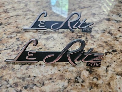 2 BRAND NEW chrome & black LE RITZ E&G METAL ROOF B POST EMBLEM E&G CLASSICS