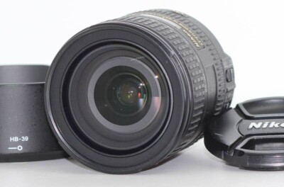 NIKON Nikon AF-S DX NIKKOR 16-85mm F3.5-5.6 G ED VR with front and