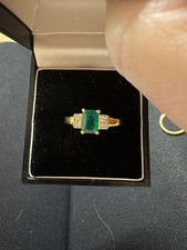 emerald and diamond ring. Size P. 9ct gold hardly worn.