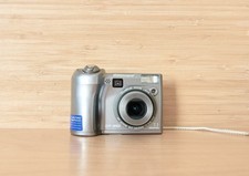 OLYMPUS SP-310 7.1MP Digital Camera, 3x Optical Zoom, Silver